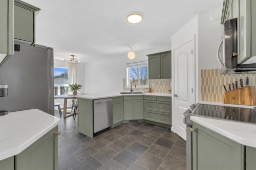 21 Silver Drive, Blackfalds, AB - Indoor Photo Showing Kitchen With Double Sink