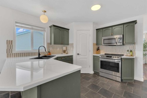 21 Silver Drive, Blackfalds, AB - Indoor Photo Showing Kitchen With Double Sink