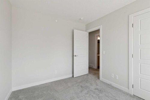 322 Hotchkiss Common Se, Calgary, AB - Indoor Photo Showing Other Room