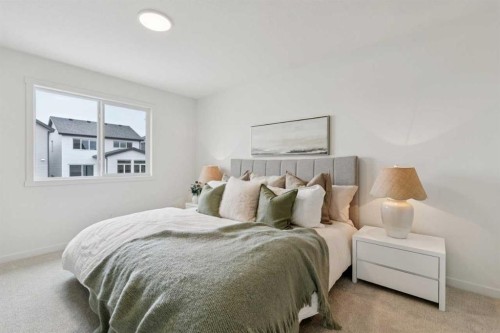 65 Bartlett Way Se, Calgary, AB - Indoor Photo Showing Bedroom