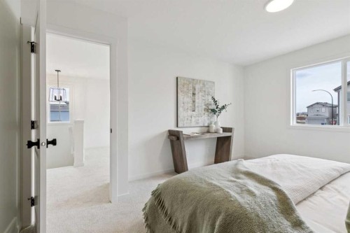 65 Bartlett Way Se, Calgary, AB - Indoor Photo Showing Bedroom