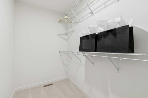 65 Bartlett Way Se, Calgary, AB - Indoor With Storage