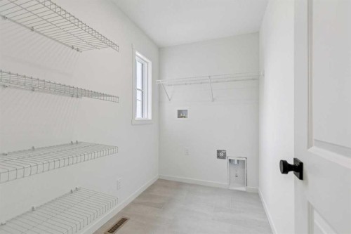 65 Bartlett Way Se, Calgary, AB - Indoor With Storage