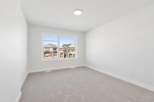 339 Fireside Drive, Cochrane, AB - Indoor Photo Showing Other Room