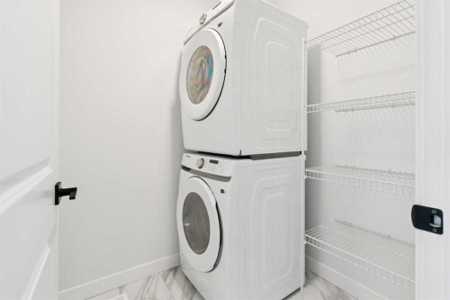 339 Fireside Drive, Cochrane, AB - Indoor Photo Showing Laundry Room