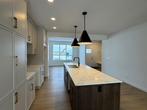 50 Lavelle Close, Red Deer, AB - Indoor Photo Showing Kitchen With Double Sink With Upgraded Kitchen