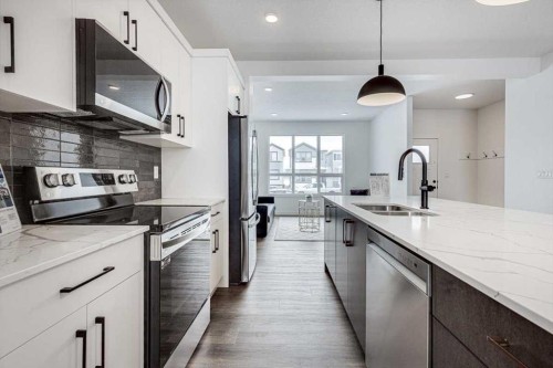 50 Lavelle Close, Red Deer, AB - Indoor Photo Showing Kitchen With Double Sink With Upgraded Kitchen