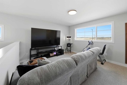 56 Trinity Street, Lacombe, AB - Indoor Photo Showing Living Room