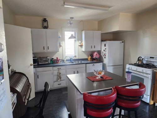 4914 48 Street, Killam, AB - Indoor Photo Showing Kitchen With Double Sink