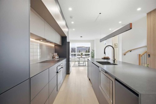 5232 21 Avenue Nw, Calgary, AB - Indoor Photo Showing Kitchen With Double Sink With Upgraded Kitchen