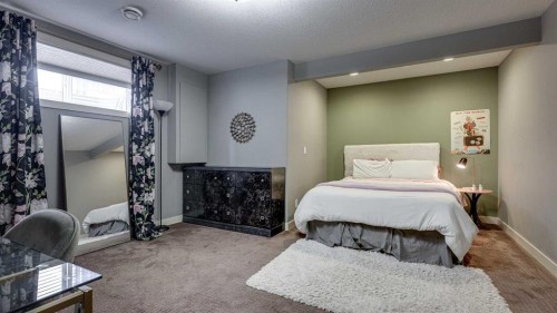 84 Isbister Close, Red Deer, AB - Indoor Photo Showing Bedroom
