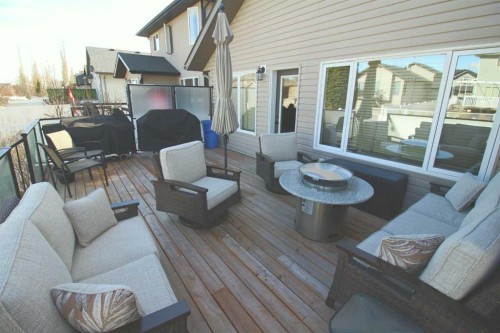 84 Isbister Close, Red Deer, AB - Outdoor With Deck Patio Veranda With Exterior