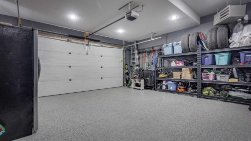 84 Isbister Close, Red Deer, AB - Indoor Photo Showing Garage