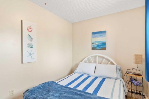 5014 43 Street, Sylvan Lake, AB - Indoor Photo Showing Bedroom