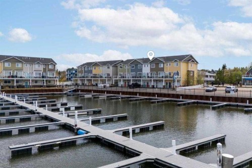 103-5210 Lakeshore Drive, Sylvan Lake, AB - Outdoor With Body Of Water