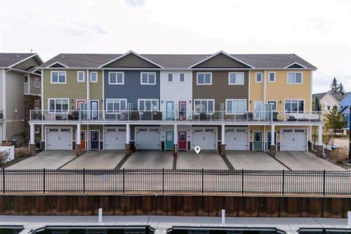 103-5210 Lakeshore Drive, Sylvan Lake, AB - Outdoor With Deck Patio Veranda With Facade