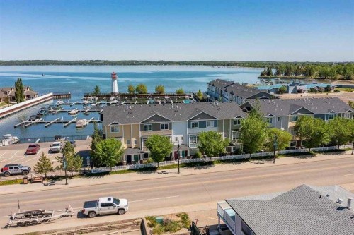 103-5210 Lakeshore Drive, Sylvan Lake, AB - Outdoor With Body Of Water With View