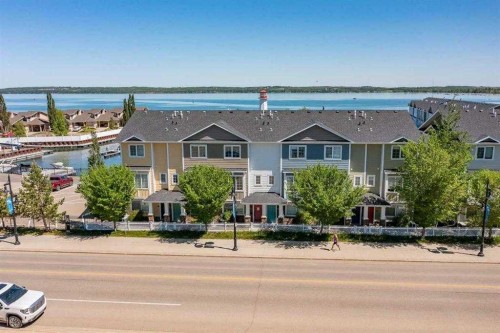 103-5210 Lakeshore Drive, Sylvan Lake, AB - Outdoor With Body Of Water With Facade
