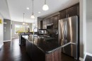 103-5210 Lakeshore Drive, Sylvan Lake, AB  - Indoor Photo Showing Kitchen With Double Sink With Upgraded Kitchen 