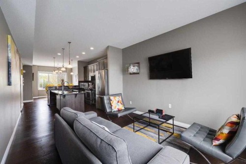103-5210 Lakeshore Drive, Sylvan Lake, AB - Indoor Photo Showing Living Room