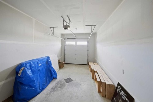61 Pinnacle Close, Blackfalds, AB - Indoor Photo Showing Garage