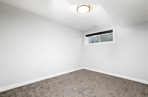 23 Cole Way, Sylvan Lake, AB - Indoor Photo Showing Other Room