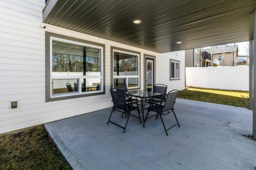 23 Cole Way, Sylvan Lake, AB - Outdoor With Deck Patio Veranda With Exterior