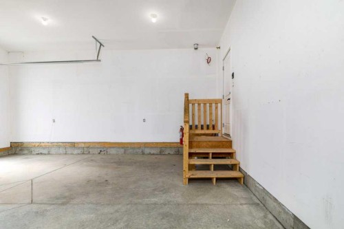 23 Cole Way, Sylvan Lake, AB - Indoor Photo Showing Garage