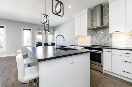 23 Cole Way, Sylvan Lake, AB - Indoor Photo Showing Kitchen With Upgraded Kitchen