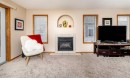 14D-32 Daines Avenue, Red Deer, AB  - Indoor Photo Showing Other Room With Fireplace 