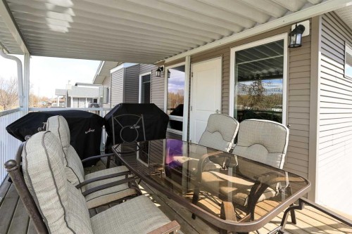 137 Coachman Way, Blackfalds, AB - Outdoor With Deck Patio Veranda With Exterior