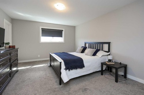 137 Coachman Way, Blackfalds, AB - Indoor Photo Showing Bedroom