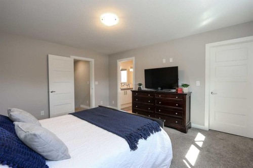 137 Coachman Way, Blackfalds, AB - Indoor Photo Showing Bedroom