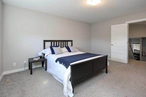 137 Coachman Way, Blackfalds, AB - Indoor Photo Showing Bedroom