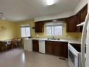 5 Sproule Place, Bashaw, AB  - Indoor Photo Showing Kitchen With Double Sink 