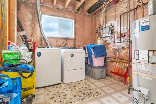 74 Fulmar Close, Sylvan Lake, AB - Indoor Photo Showing Laundry Room