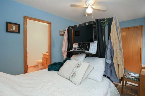 77 Duval Crescent, Red Deer, AB - Indoor Photo Showing Bedroom
