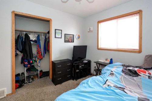 77 Duval Crescent, Red Deer, AB - Indoor Photo Showing Bedroom