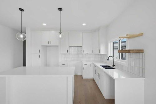 37 Maclean Close, Blackfalds, AB - Indoor Photo Showing Kitchen With Double Sink With Upgraded Kitchen