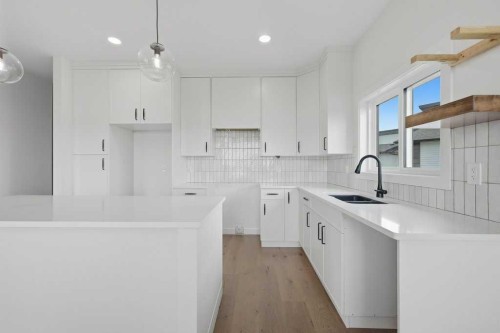 37 Maclean Close, Blackfalds, AB - Indoor Photo Showing Kitchen With Double Sink With Upgraded Kitchen