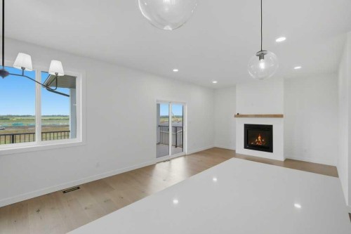 37 Maclean Close, Blackfalds, AB - Indoor Photo Showing Other Room With Fireplace