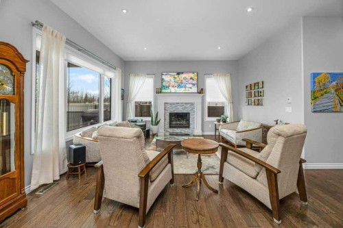 105 Connaught Crescent, Red Deer, AB - Indoor Photo Showing Living Room With Fireplace