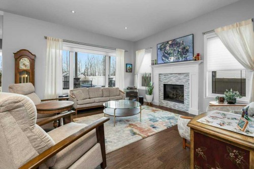 105 Connaught Crescent, Red Deer, AB - Indoor Photo Showing Living Room With Fireplace