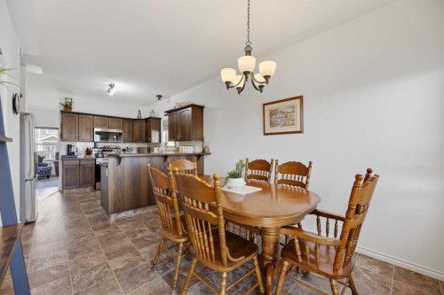 38 Regatta Way, Sylvan Lake, AB - Indoor Photo Showing Dining Room
