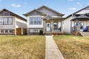 38 Regatta Way, Sylvan Lake, AB  - Outdoor With Deck Patio Veranda With Facade 
