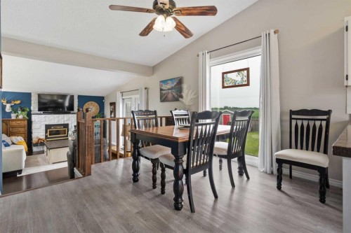 5228 59 Avenue, Viking, AB - Indoor Photo Showing Dining Room With Fireplace