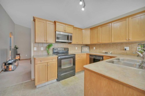 628 Lancaster Drive, Red Deer, AB - Indoor Photo Showing Kitchen With Double Sink