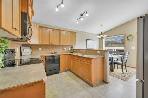 628 Lancaster Drive, Red Deer, AB - Indoor Photo Showing Kitchen With Double Sink