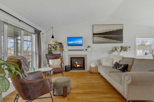 45 Dowler Street, Red Deer, AB - Indoor Photo Showing Living Room With Fireplace