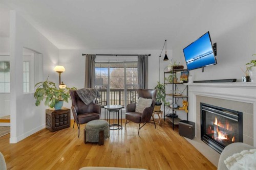 45 Dowler Street, Red Deer, AB - Indoor Photo Showing Living Room With Fireplace